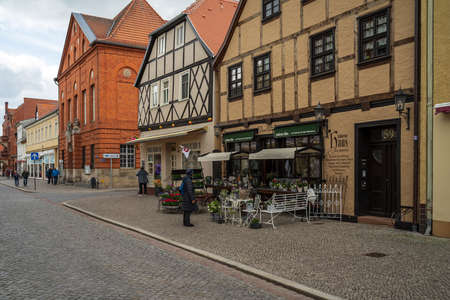 TANGERMUENDE, GERMANY - APRIL 24, 2021: Flower shop on old street of a historic town of Tangermuende. Saxony-Anhalt state.のeditorial素材
