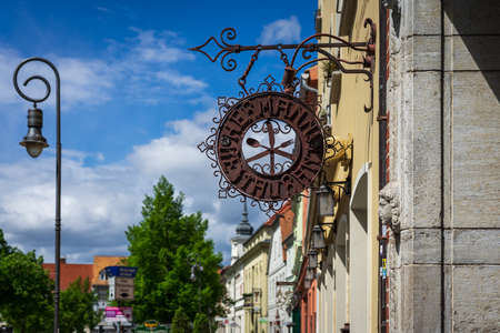 JUETERBOG, GERMANY - MAY 23, 2021: Beautiful wrought iron sign "Hermanns Restaurant" in old town. Juterbog is a historic town in north-eastern Germany, in the district of Brandenburg.のeditorial素材