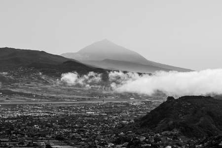 View of the valley, the old capital of the island of San Cristobal de La Laguna. Tenerife. Canary Islands. Spain. View from the observation deck - Mirador De Jardina. Black and white.の写真素材