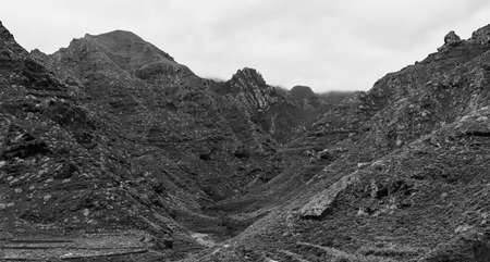 Mountain landscape. Mountain view from the observation deck - Mirador Punta Del Hidalgo. Black and...