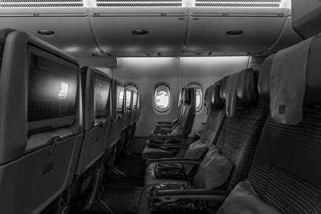 BERLIN, GERMANY - JUNE 23, 2022: Interior of an economy class of the world's largest aircraft Airbus A380-800. Emirates Airline. Black and white. Exhibition ILA Berlin Air Show 2022のeditorial素材