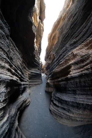 Las Grietas - volcanic fissure formed on the slopes of Montana Blanca. Lanzarote, Canary Islands. Spain.の写真素材