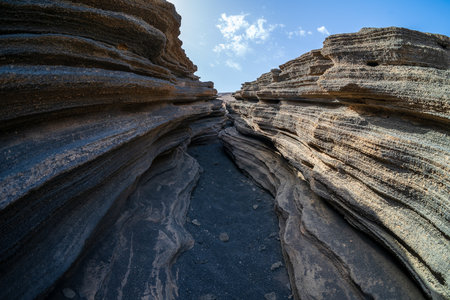 Las Grietas - volcanic fissure formed on the slopes of Montana Blanca. Lanzarote, Canary Islands. Spain.の写真素材