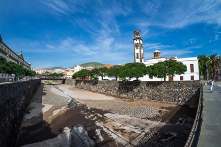 SANTA CRUZ, CANARY ISLANDS, SPAIN - OCTOBER 28, 2022: City view. In the background - Church of Our Lady of the Conception (right) and the Museum of Nature and Archeology (left). Fisheye lens.のeditorial素材