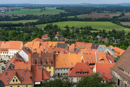 BURG STOLPEN, GERMANY - AUGUST 28, 2022: View of the city from the height of the watchtower of a medieval fortress on a basalt mountain. Saxony.のeditorial素材