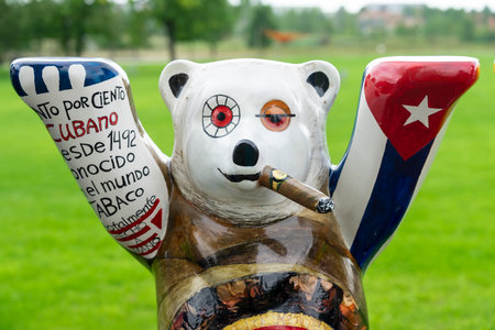 BERLIN - AUGUST 29, 2022: Bear as a symbol of Berlin in original and national patterns - Cuba, close-up.のeditorial素材