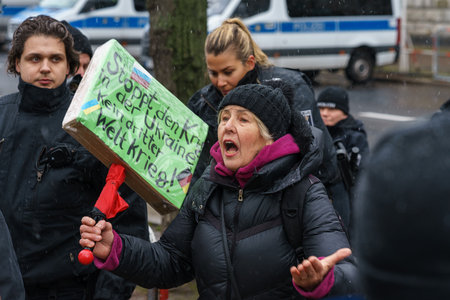 BERLIN - FEBRUARY 25, 2023: A large demonstration at the Brandenburg Gate Under the Motto "Manifesto For Peace". Peace negotiations instead of weapons!のeditorial素材