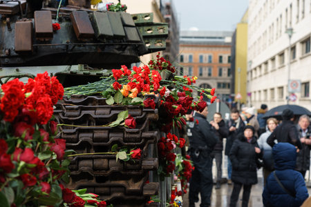 BERLIN - FEBRUARY 25, 2023: Destroyed Russian T-72 tank in front of the Russian embassy on Unter der Linden.のeditorial素材