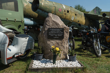 FINOWFURT, GERMANY - APRIL 22, 2023: Monument at the former Soviet military airfield to the officers Captain Boris Kapustin and Lieutenant Yuri Yanov who died in a plane crash in the sky over Berlin.のeditorial素材