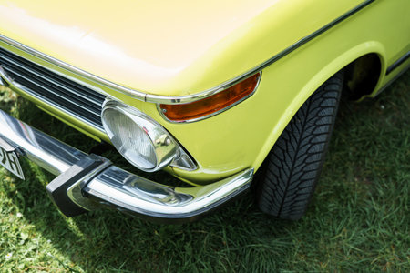 WERDER (HAVEL), GERMANY - MAY 20, 2023: The fragment of a compact executive car BMW 2002 (BMW 02 Series), 1972. Oldtimer - Festival Werder Classics 2023のeditorial素材