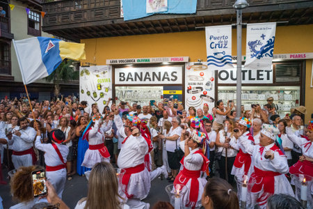 PUERTO DE LA CRUZ, SPAIN - JULY 16, 2023: Procession in honor of Our Lady of Mount Carmel through the streets of the town.のeditorial素材