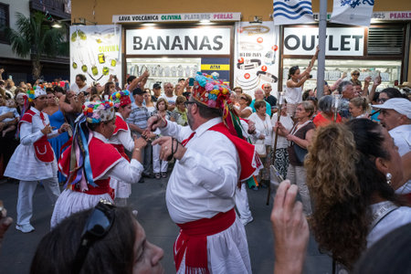 PUERTO DE LA CRUZ, SPAIN - JULY 16, 2023: Procession in honor of Our Lady of Mount Carmel through the streets of the town.のeditorial素材