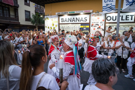 PUERTO DE LA CRUZ, SPAIN - JULY 16, 2023: Procession in honor of Our Lady of Mount Carmel through the streets of the town.のeditorial素材