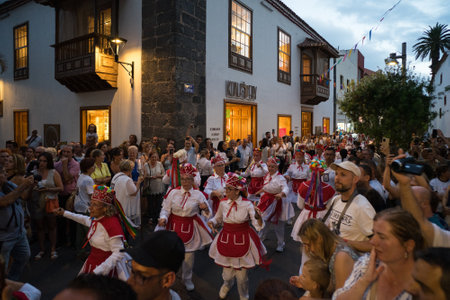 PUERTO DE LA CRUZ, SPAIN - JULY 16, 2023: Procession in honor of Our Lady of Mount Carmel through the streets of the town.のeditorial素材