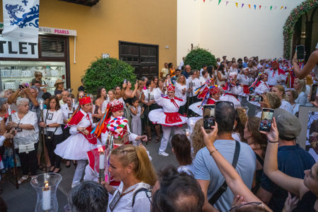 PUERTO DE LA CRUZ, SPAIN - JULY 16, 2023: Procession in honor of Our Lady of Mount Carmel through the streets of the town.のeditorial素材