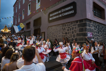 PUERTO DE LA CRUZ, SPAIN - JULY 16, 2023: Procession in honor of Our Lady of Mount Carmel through the streets of the town.のeditorial素材