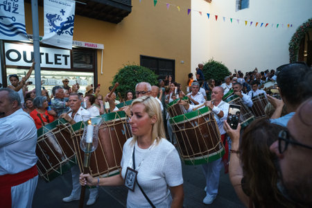 PUERTO DE LA CRUZ, SPAIN - JULY 16, 2023: Procession in honor of Our Lady of Mount Carmel through the streets of the town.のeditorial素材