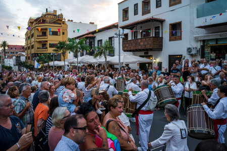 PUERTO DE LA CRUZ, SPAIN - JULY 16, 2023: Procession in honor of Our Lady of Mount Carmel through the streets of the town.のeditorial素材