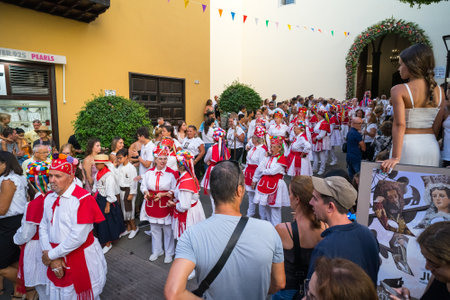 PUERTO DE LA CRUZ, SPAIN - JULY 16, 2023: Procession in honor of Our Lady of Mount Carmel through the streets of the town.のeditorial素材