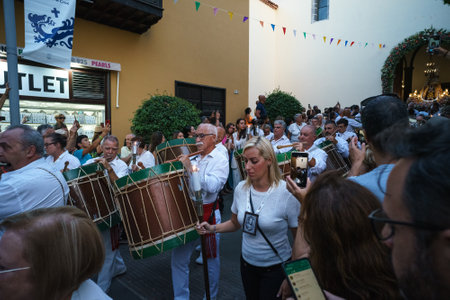 PUERTO DE LA CRUZ, SPAIN - JULY 16, 2023: Procession in honor of Our Lady of Mount Carmel through the streets of the town.のeditorial素材