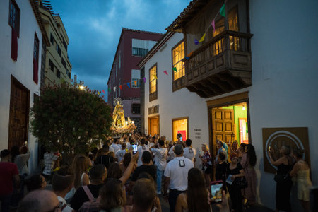 PUERTO DE LA CRUZ, SPAIN - JULY 16, 2023: Procession in honor of Our Lady of Mount Carmel through the streets of the town.のeditorial素材