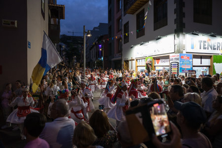 PUERTO DE LA CRUZ, SPAIN - JULY 16, 2023: Procession in honor of Our Lady of Mount Carmel through the streets of the town.のeditorial素材