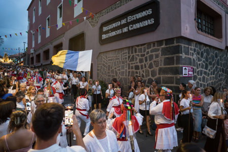 PUERTO DE LA CRUZ, SPAIN - JULY 16, 2023: Procession in honor of Our Lady of Mount Carmel through the streets of the town.のeditorial素材