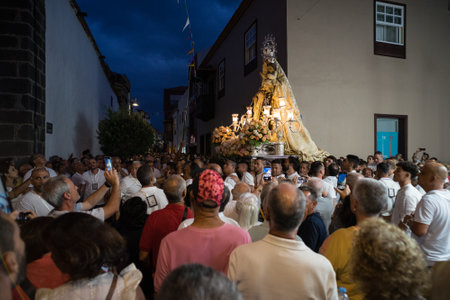 PUERTO DE LA CRUZ, SPAIN - JULY 16, 2023: Procession in honor of Our Lady of Mount Carmel through...