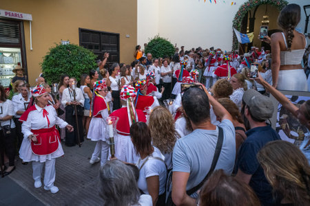 PUERTO DE LA CRUZ, SPAIN - JULY 16, 2023: Procession in honor of Our Lady of Mount Carmel through the streets of the town.のeditorial素材