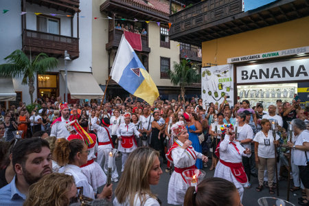 PUERTO DE LA CRUZ, SPAIN - JULY 16, 2023: Procession in honor of Our Lady of Mount Carmel through the streets of the town.のeditorial素材