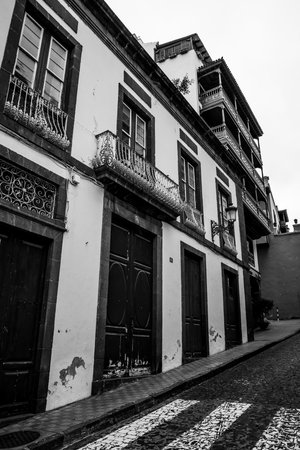 Facade of an old house and street of the old town of Icod de los Vinos, on the northern coast of Tenerife. Canary Islands, Spain.の写真素材
