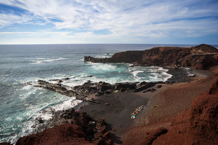 View of the coast and the Atlantic Ocean. El Golfo viewpoint. Lanzarote. Canary Islands. Spain.の写真素材