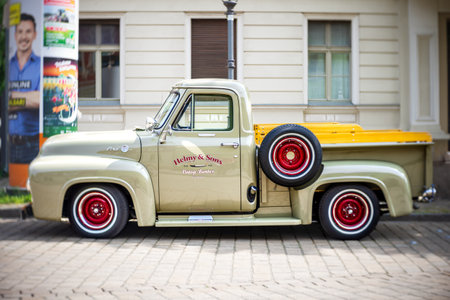 WERDER (HAVEL), GERMANY - MAY 20, 2023: Full-size pickup truck Ford F-100. Swirl bokeh. Art lens. Oldtimer - Festival Werder Classics 2023のeditorial素材