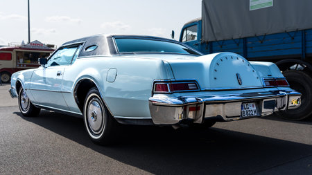 LINTHE, GERMANY - MAY 27, 2023: The personal luxury coupe Lincoln Continental Mark IV. Rear view....
