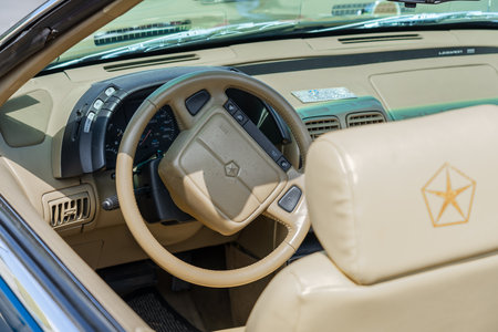 LINTHE, GERMANY - MAY 27, 2023: The interior of personal luxury car Chrysler LeBaron GTS, 1993. Die Oldtimer Show 2023.のeditorial素材