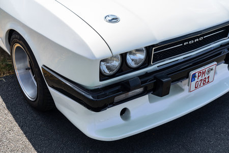 LINTHE, GERMANY - MAY 27, 2023: The fragment of mid-size sports car Ford Capri Mk III, 1981. Die Oldtimer Show 2023.のeditorial素材