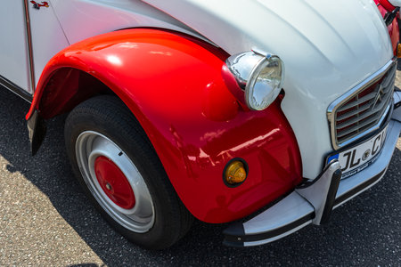 LINTHE, GERMANY - MAY 27, 2023: The fragment of economy car Citroen 2CV. Die Oldtimer Show 2023.のeditorial素材