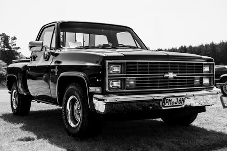 LINTHE, GERMANY - MAY 27, 2023: The full-size truck Chevrolet C10 Scottsdale, 1983. Black and white. Die Oldtimer Show 2023.のeditorial素材