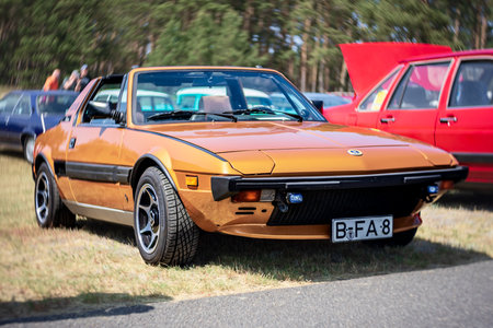 LINTHE, GERMANY - MAY 27, 2023: The sports car Bertone X1/9 (Fiat X1/9). Art lens. Swirl bokeh. Die Oldtimer Show 2023.のeditorial素材