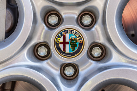 LINTHE, GERMANY - MAY 27, 2023: The aluminum rims of sports car Alfa Romeo 4C, close-up. Die...