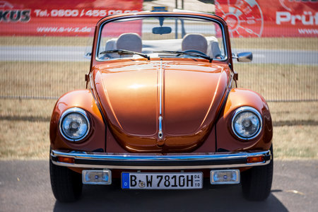 LINTHE, GERMANY - MAY 27, 2023: The subcompact, economy car Volkswagen Beetle. Art lens. Swirl bokeh. Die Oldtimer Show 2023.のeditorial素材
