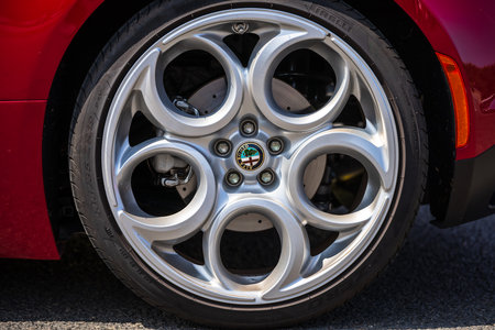 LINTHE, GERMANY - MAY 27, 2023: The aluminum rims of sports car Alfa Romeo 4C, close-up. Die Oldtimer Show 2023.のeditorial素材