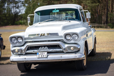 LINTHE, GERMANY - MAY 27, 2023: The pickup track GMC Suburban, 1958. Art lens. Swirl bokeh. Die Oldtimer Show 2023.のeditorial素材