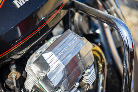 LINTHE, GERMANY - MAY 27, 2023: The engine of Moto Guzzi motorcycle, close-up. Art lens. Swirl bokeh. Die Oldtimer Show 2023.のeditorial素材
