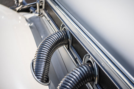 LINTHE, GERMANY - MAY 27, 2023: The exhaust system fragment of a roadster Mercedes-Benz 500K (W29). Art lens. Swirl bokeh. Die Oldtimer Show 2023.のeditorial素材