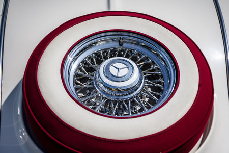 LINTHE, GERMANY - MAY 27, 2023: The spare wheel of a roadster Mercedes-Benz 500K (W29). Art lens. Swirl bokeh. Die Oldtimer Show 2023.のeditorial素材
