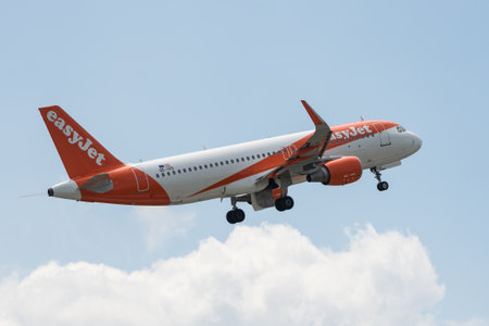 BERLIN - JUNE 06, 2024: The narrow-body airliner Airbus A320-214 by easyJet Europe.のeditorial素材