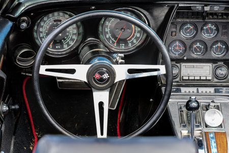 FINOWFURT, GERMANY - JUNE 28, 2025: Interior detail with dashboard, steering wheel and gauges,...