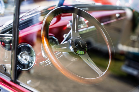 FINOWFURT, GERMANY â€“ JUNE 28, 2025: Interior of classic car seen through window. Roadrunner's...