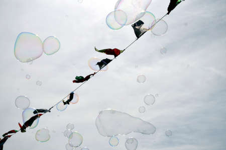 rainbow bubble in the sky with medieval pennants